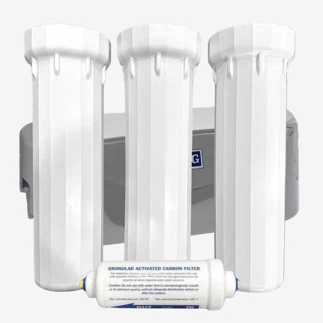 Four Clean Water Co. filter cartridges, three upright and one horizontal, shown before a gray water filtration unit on white background.